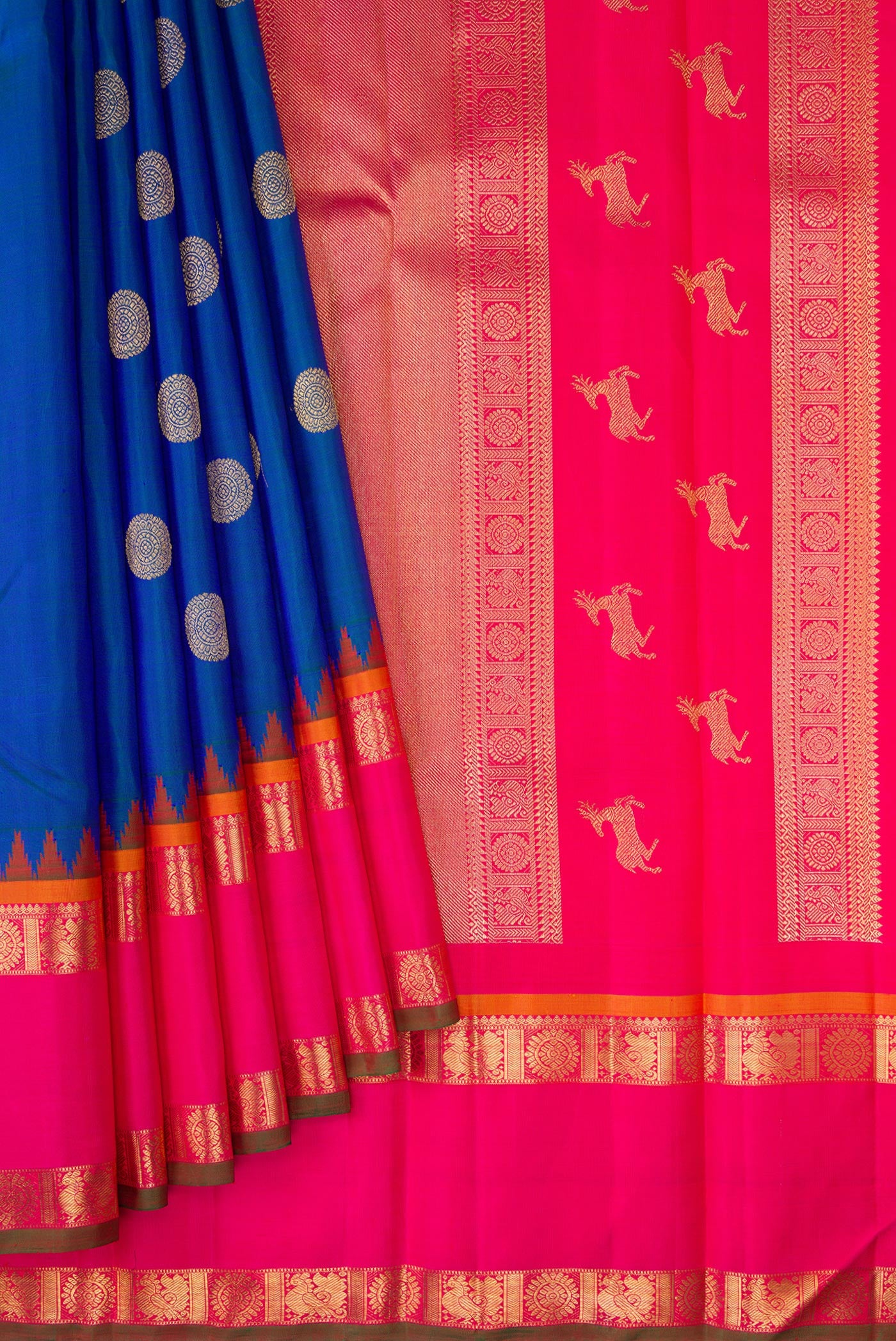 Pleats and pallu of Pure Silk Pure Zari Peacock Blue Kanjivaram Saree with Zari Butta on the body and Zari Border. 