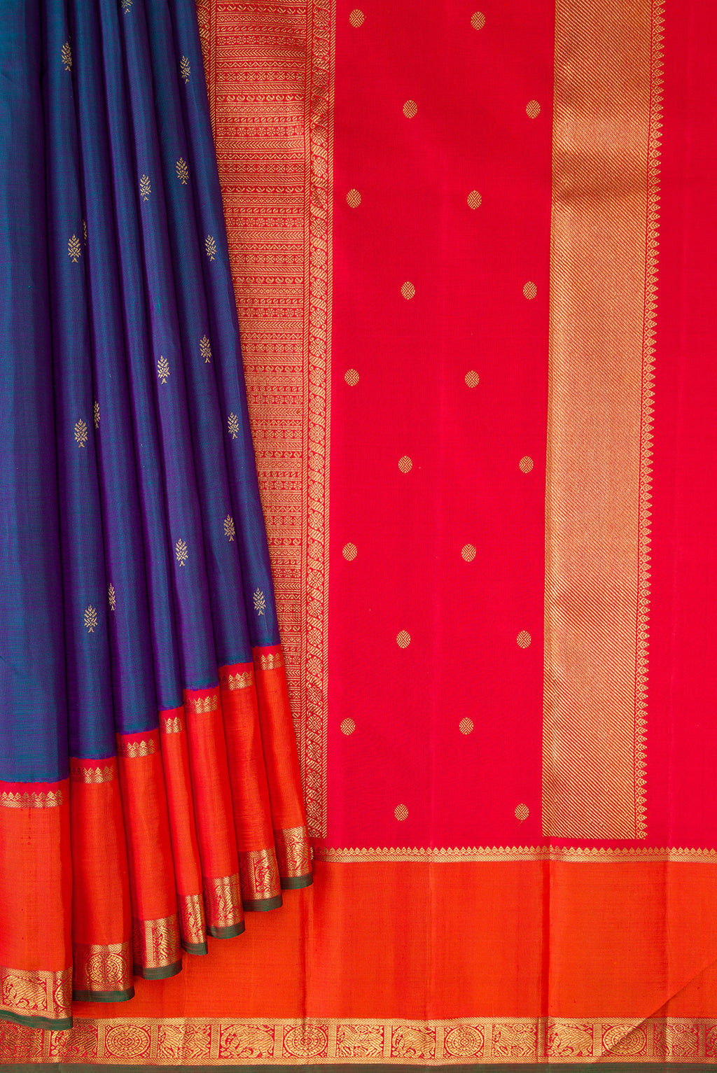 Pleats and pallu of Pure Silk Pure Zari Peacock Blue Dual Tone Kanjivaram Saree with Zari Butta on the body and Zari Border. 