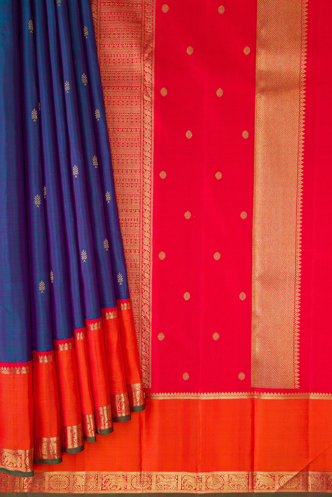 Pleats and pallu of Pure Silk Pure Zari Peacock Blue Dual Tone Kanjivaram Saree with Zari Butta on the body and Zari Border. 