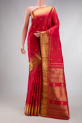 Pure Silk Pure Zari Red Dual Tone Kanjivaram Saree with Stripes on the body and Zari Border.  displayed on a mannequin
