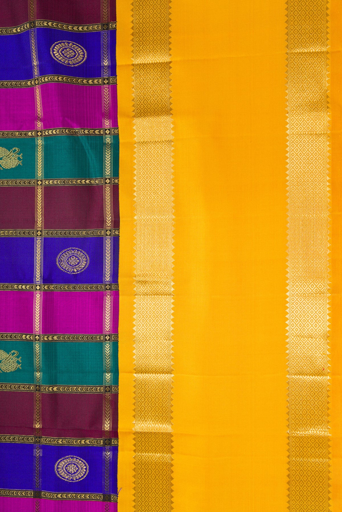 Border image of Pure Silk Pure Zari Green, Royal Blue and Maroon Color Kanjivaram Saree with Checked design on the body and Zari Border. 