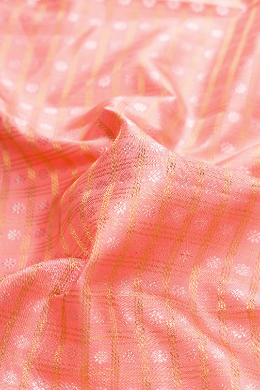 Close up of Pure Silk Pure Zari Pink Dual Tone Kanjivaram Saree with Zari Brocade on the body and Zari Border.  displaying folds