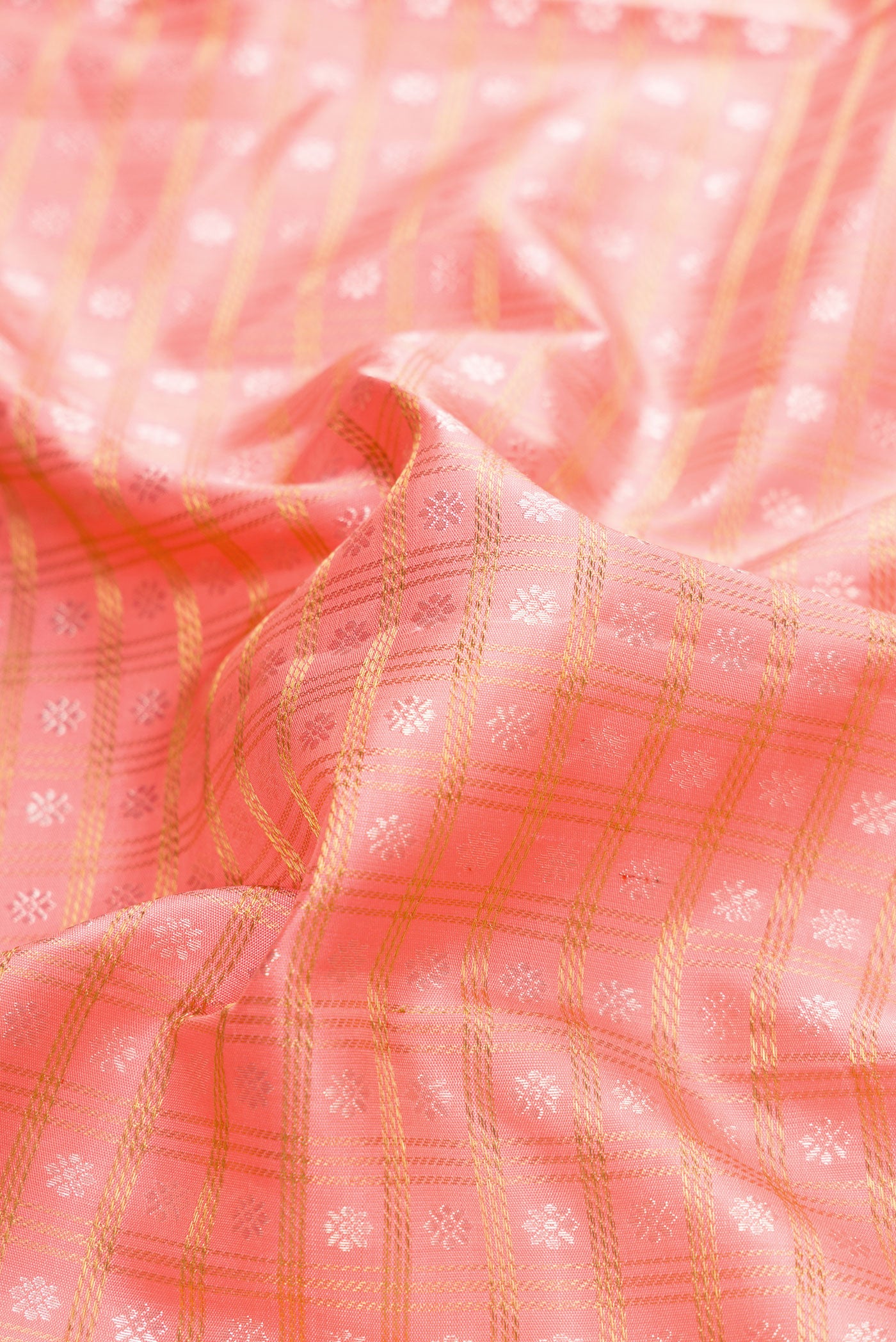 Close up of Pure Silk Pure Zari Pink Dual Tone Kanjivaram Saree with Zari Brocade on the body and Zari Border.  displaying folds