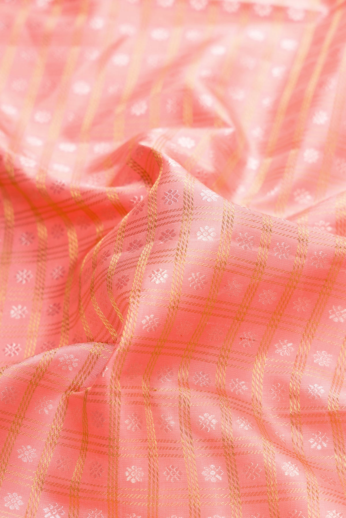 Close up of Pure Silk Pure Zari Pink Dual Tone Kanjivaram Saree with Zari Brocade on the body and Zari Border.  displaying folds
