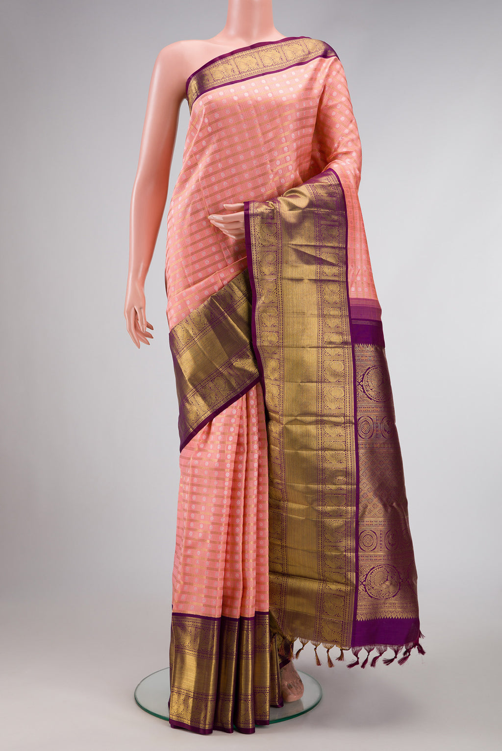 Pure Silk Pure Zari Pink Dual Tone Kanjivaram Saree with Zari Brocade on the body and Zari Border.  displayed on a mannequin