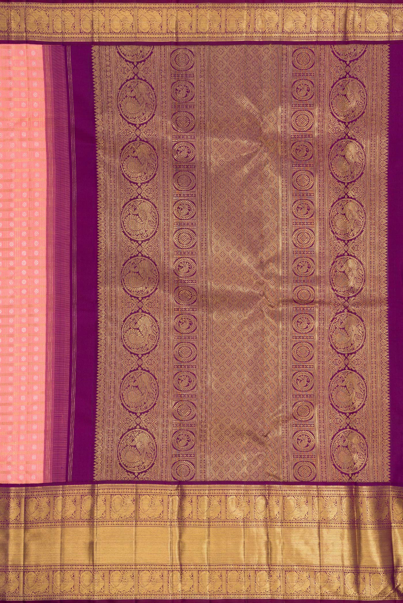 Close up image of the pallu of Pure Silk Pure Zari Pink Dual Tone Kanjivaram Saree with Zari Brocade on the body and Zari Border. 