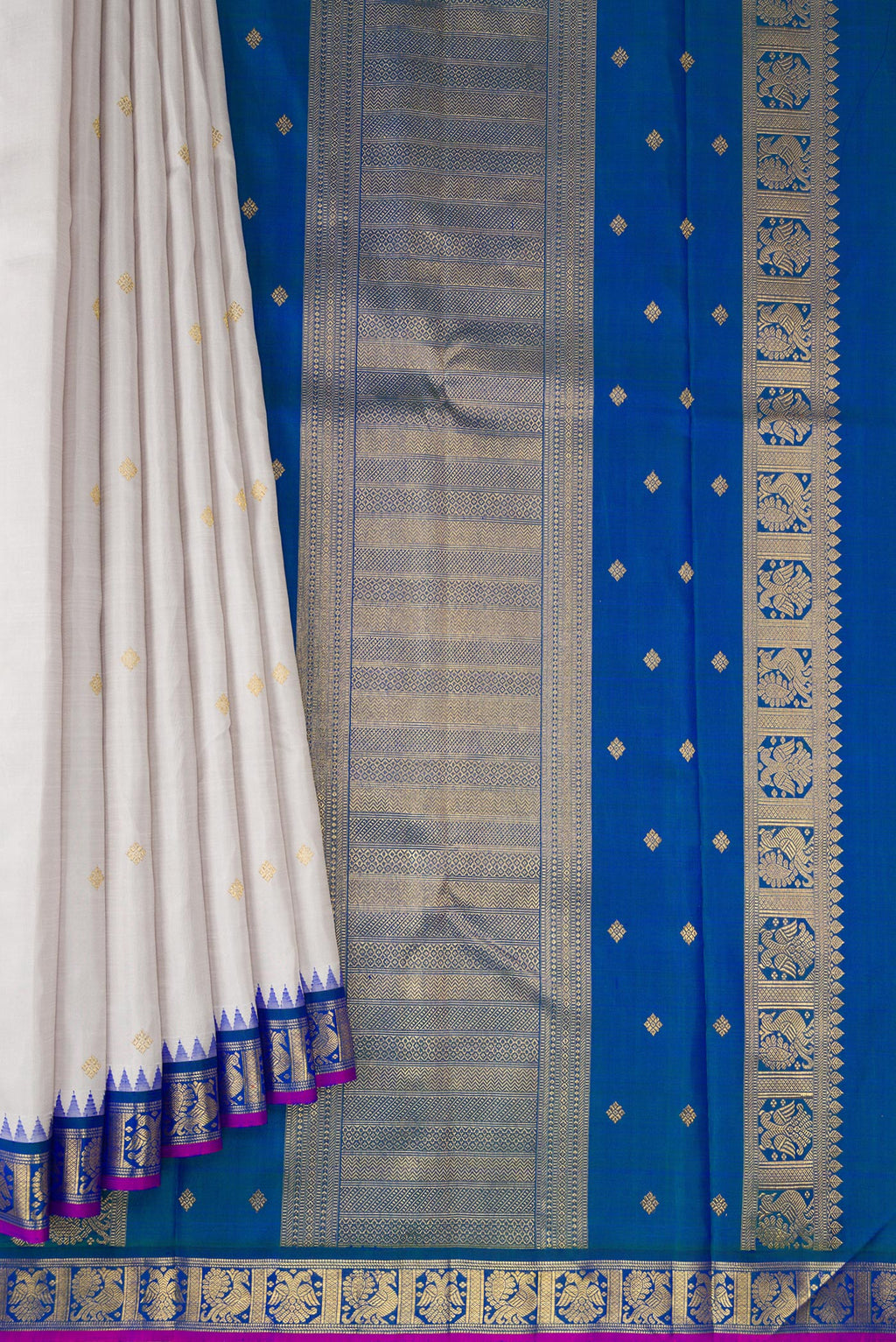 Pleats and pallu of Pure Silk Pure Zari Grey Kanjivaram Saree with Zari Butta on the body and Zari Border. 