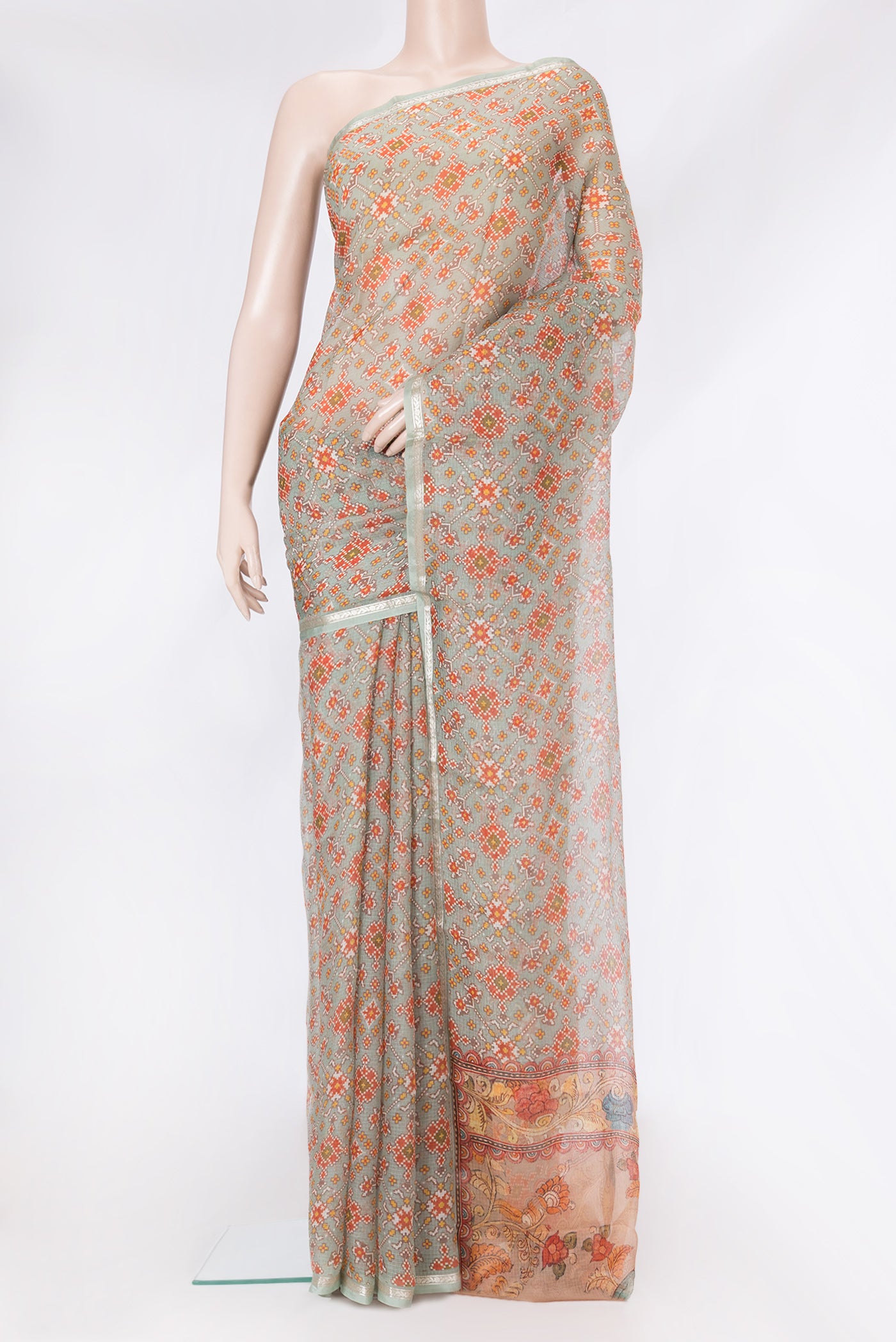 Sea Green Dual Tone Kota Silk Saree with Printed design on the body and Zari Border.  displayed on a mannequin
