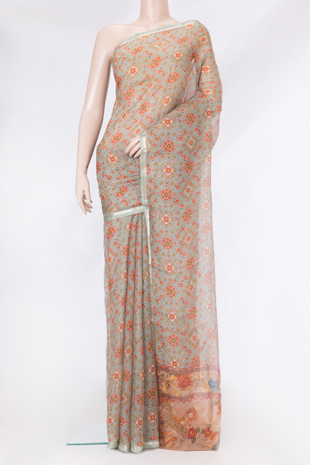 Sea Green Dual Tone Kota Silk Saree with Printed design on the body and Zari Border.  displayed on a mannequin