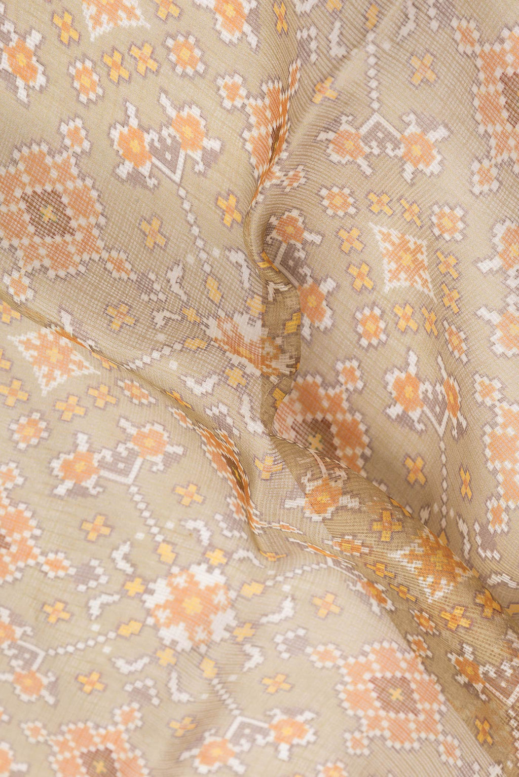 Close up of Mehandi Green Dual Tone Kota Silk Saree with Printed design on the body and Zari Border.  displaying folds