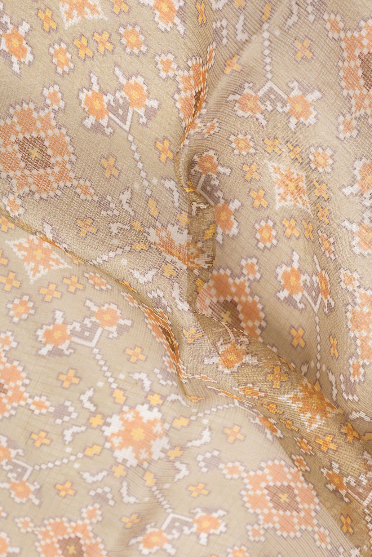 Close up of Mehandi Green Dual Tone Kota Silk Saree with Printed design on the body and Zari Border.  displaying folds