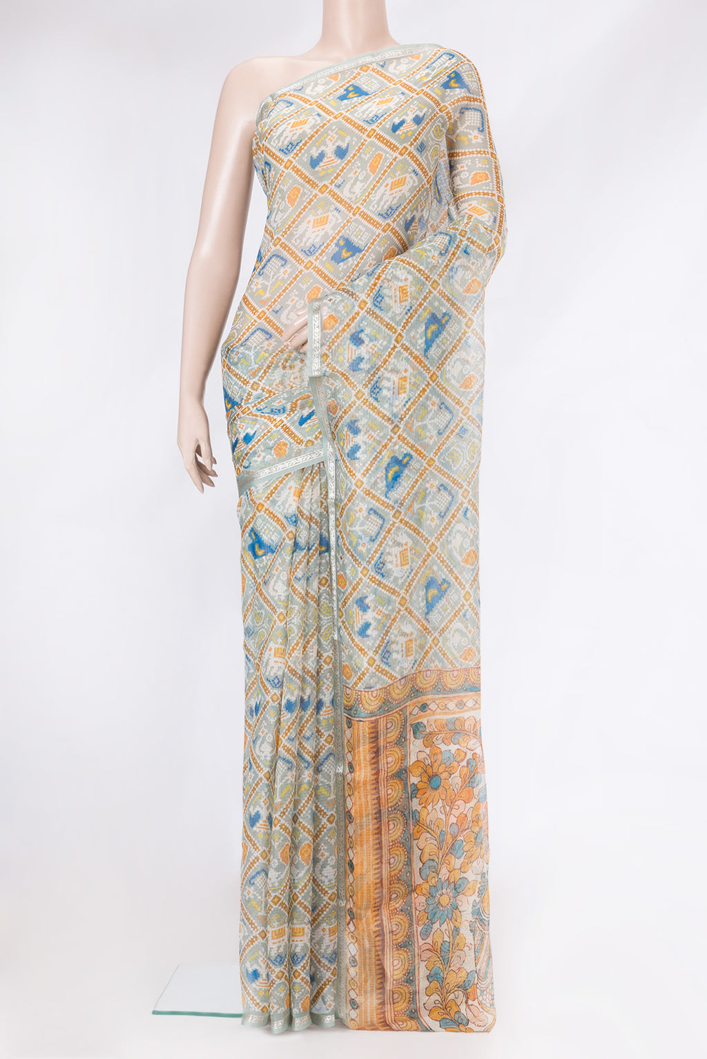 Sea Green Dual Tone Kota Silk Saree with Printed design on the body and Zari Border.  displayed on a mannequin