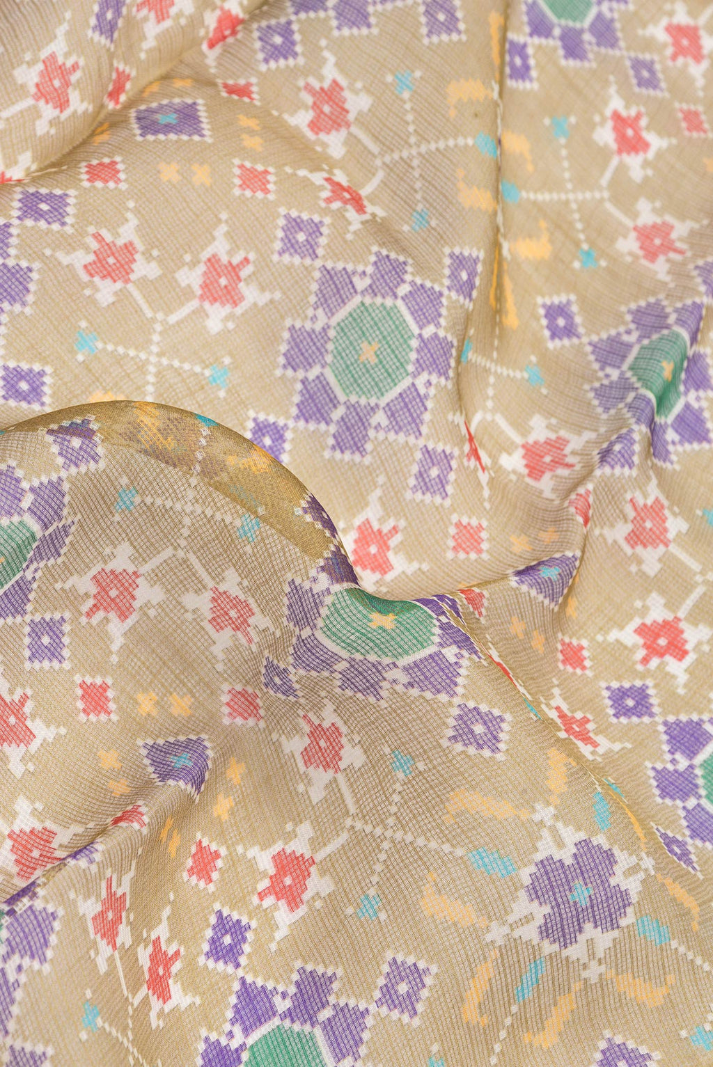 Close up of Mehandi Green Dual Tone Kota Silk Saree with Printed design on the body and Zari Border.  displaying folds