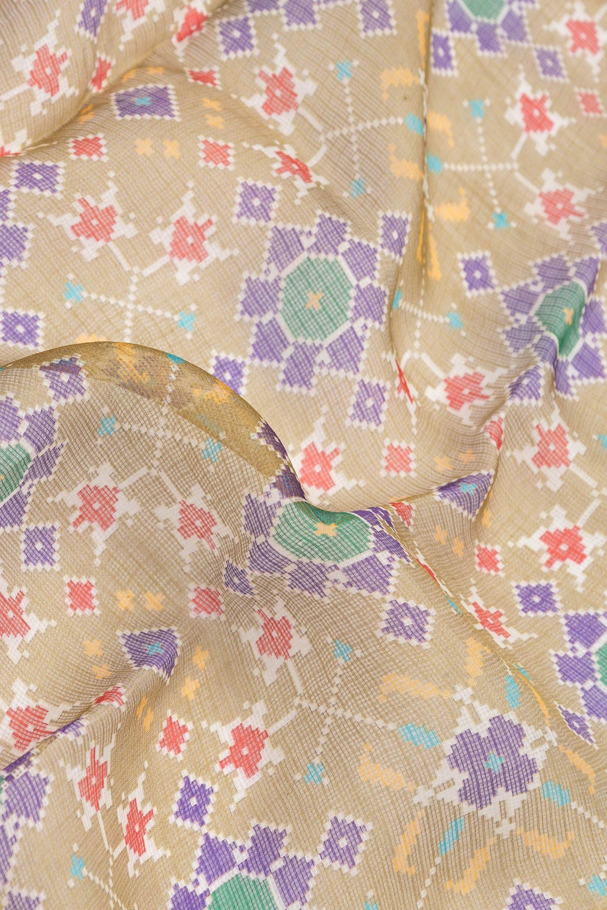 Close up of Mehandi Green Dual Tone Kota Silk Saree with Printed design on the body and Zari Border.  displaying folds