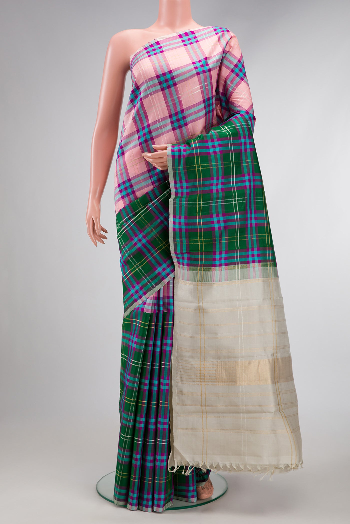 Multi Color Kanjivaram Silk Saree with Checked design on the body and Without Border.  displayed on a mannequin