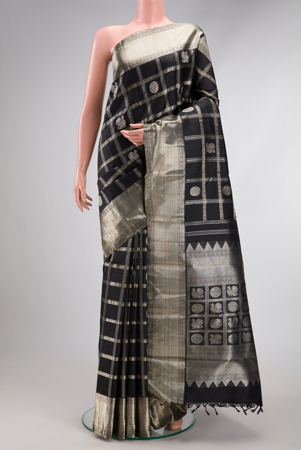 Beige and Off White Dual Tone Kanchipuram Silk Saree with Checked design on the body and Zari Border.  displayed on a mannequin