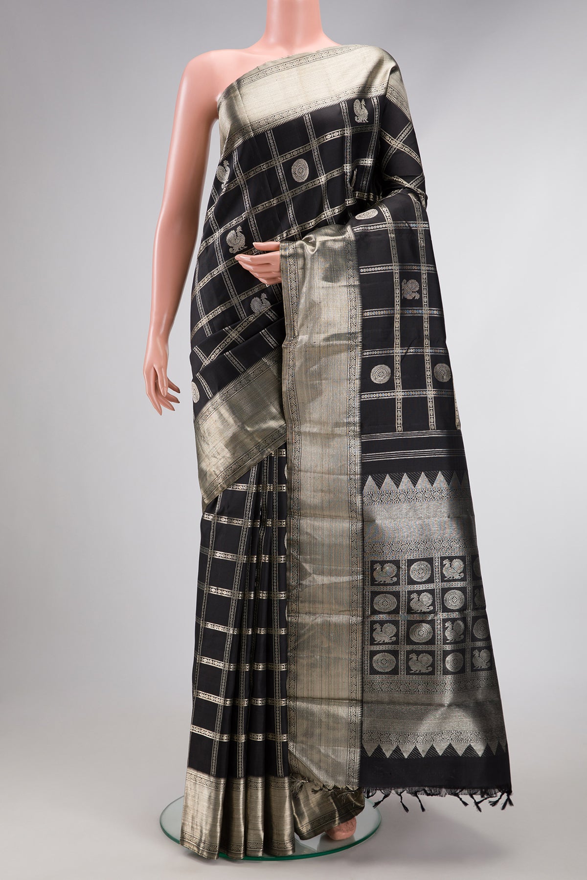 Beige and Off White Dual Tone Kanchipuram Silk Saree with Checked design on the body and Zari Border.  displayed on a mannequin