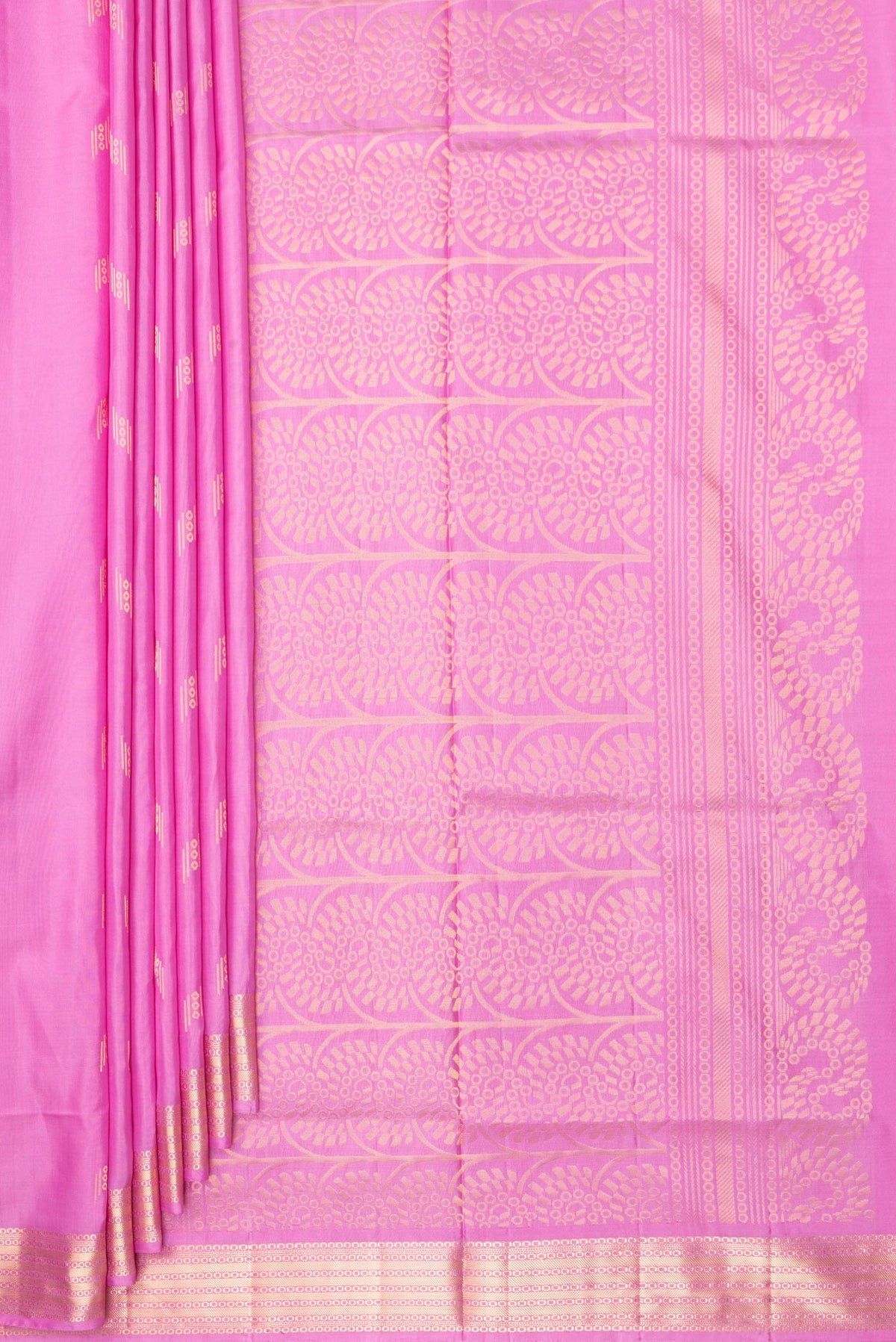 Pleats and pallu of Pure Silk Rose pink Soft Saree with Zari Butta on the body and Zari Border. 