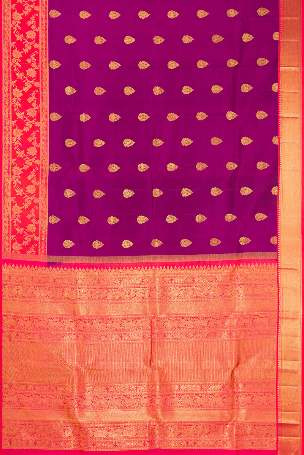 Flat view of Purple Kanjivaram Silk Saree with Zari Butta on the body and Fancy Border. 