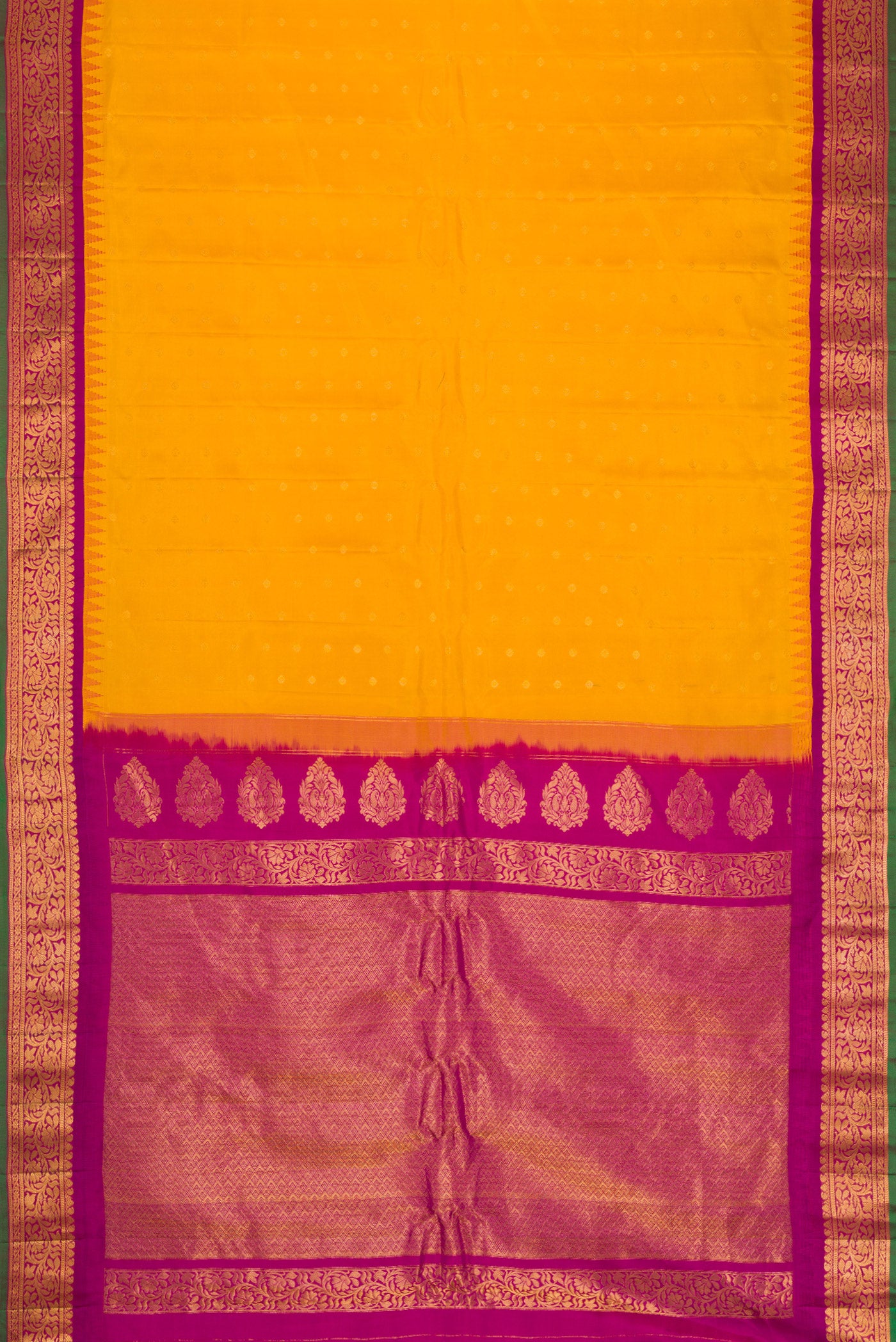 Flat view of Mustard Dual Tone Gadwal Silk Saree with Zari Butta on the body and Zari Border. 