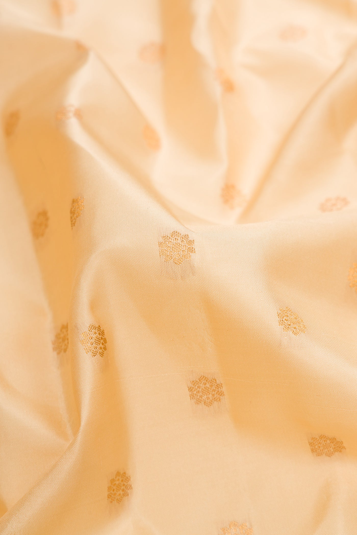 Close up of Sandal Dual Tone Gadwal Silk Saree with Zari Butta on the body and Zari Border.  displaying folds