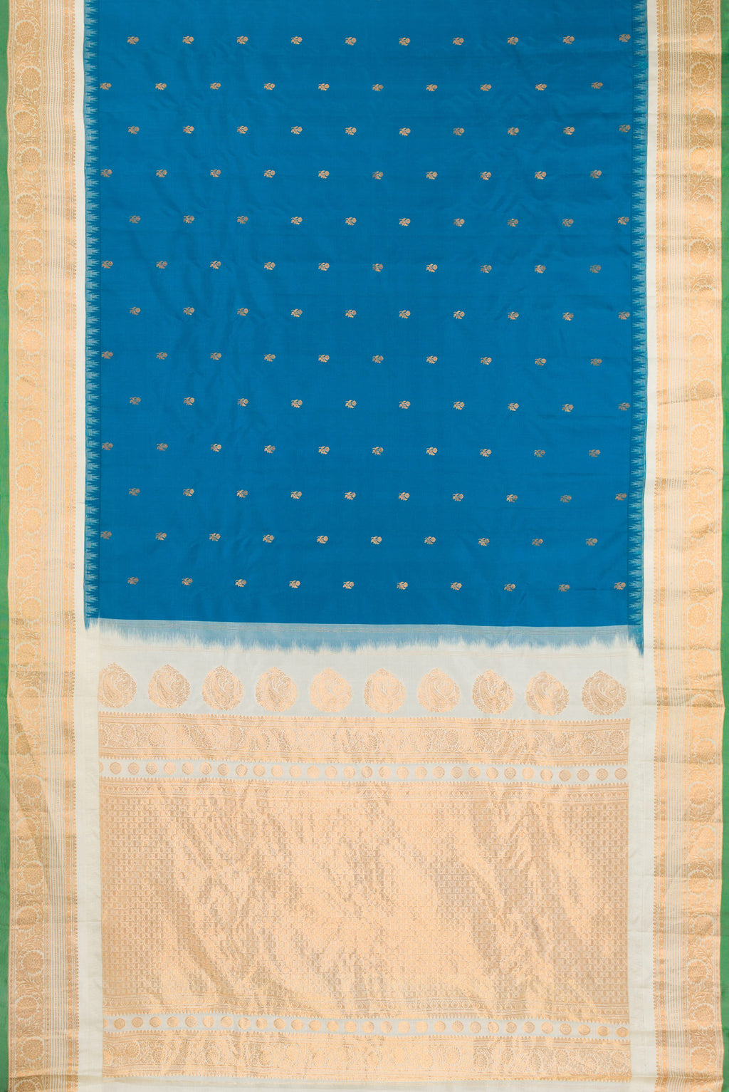 Flat view of Blue Gadwal Silk Saree with Zari Butta on the body and Zari Border. 