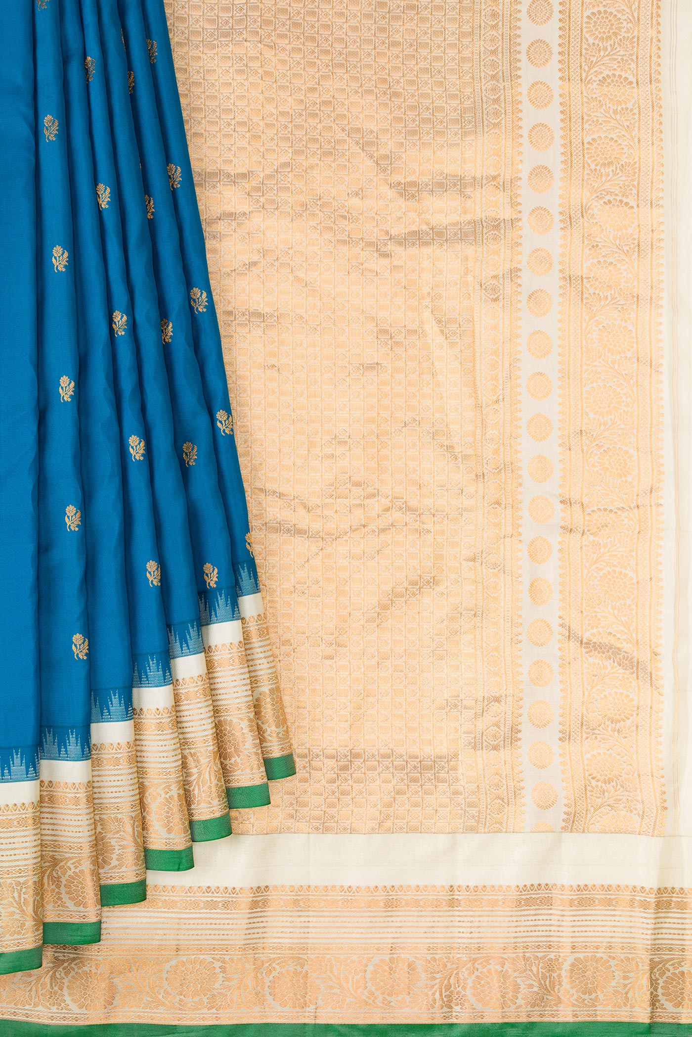 Pleats and pallu of Blue Gadwal Silk Saree with Zari Butta on the body and Zari Border. 
