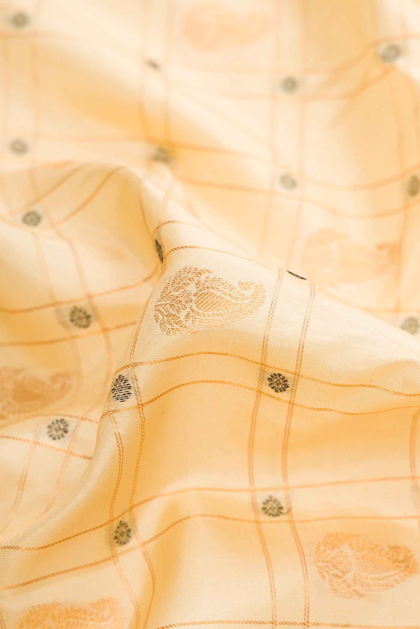 Close up of Sandal Dual Tone Gadwal Silk Saree with Zari Butta on the body and Zari Border.  displaying folds