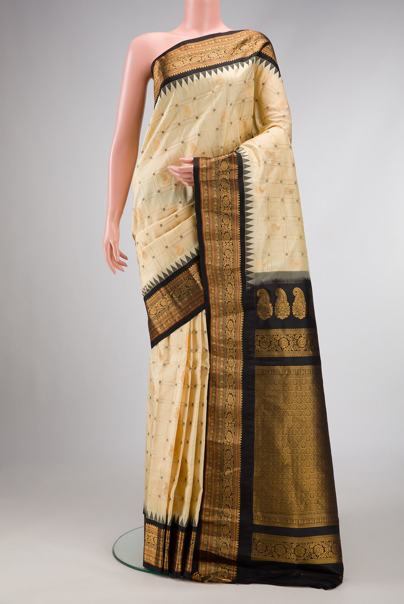 Sandal Dual Tone Gadwal Silk Saree with Zari Butta on the body and Zari Border.  displayed on a mannequin