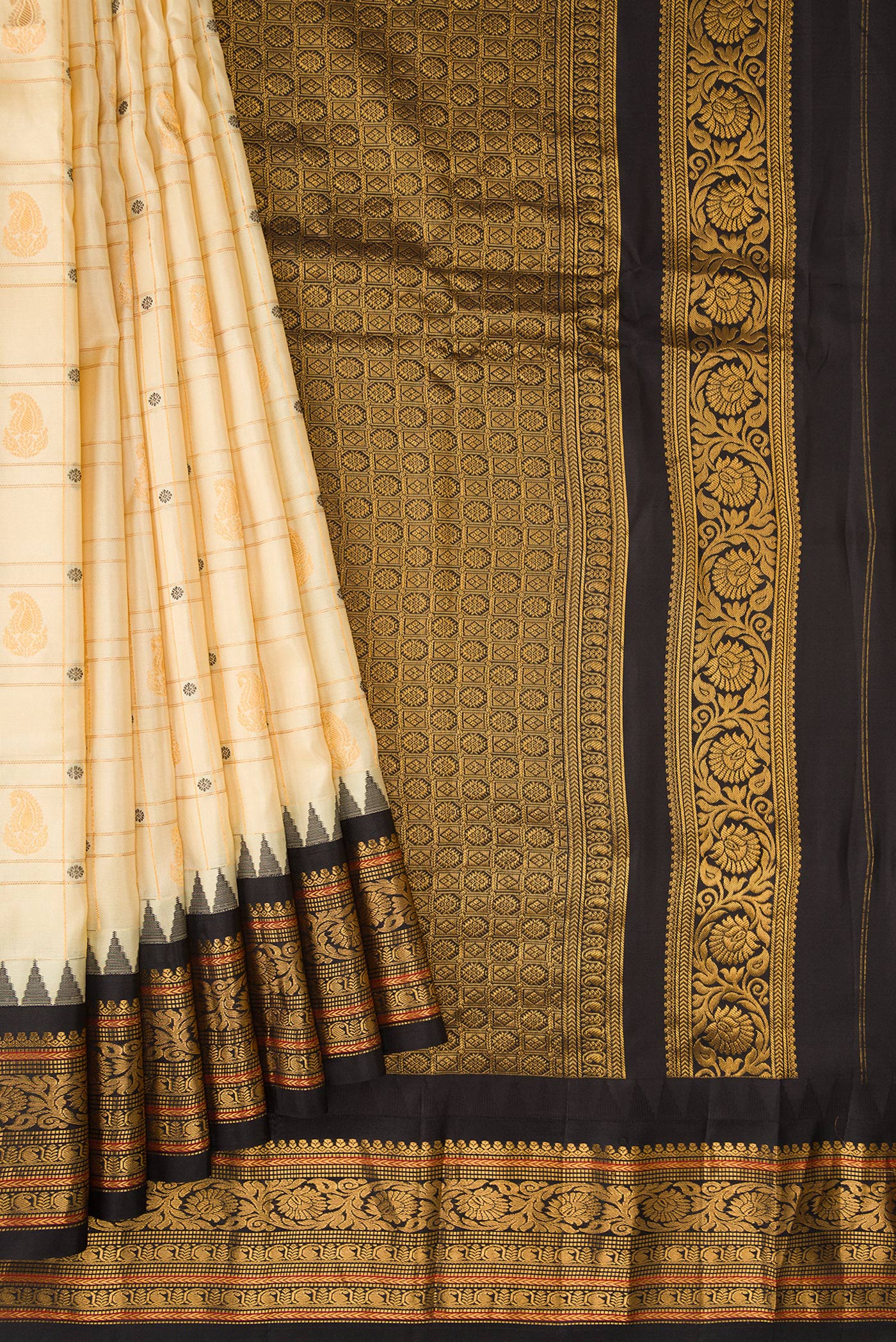 Pleats and pallu of Sandal Dual Tone Gadwal Silk Saree with Zari Butta on the body and Zari Border. 