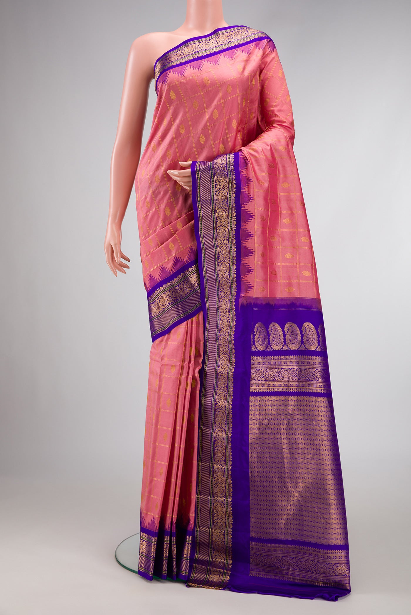Rose Gold Dual Tone Gadwal Silk Saree with Checked design on the body and Zari Border.  displayed on a mannequin