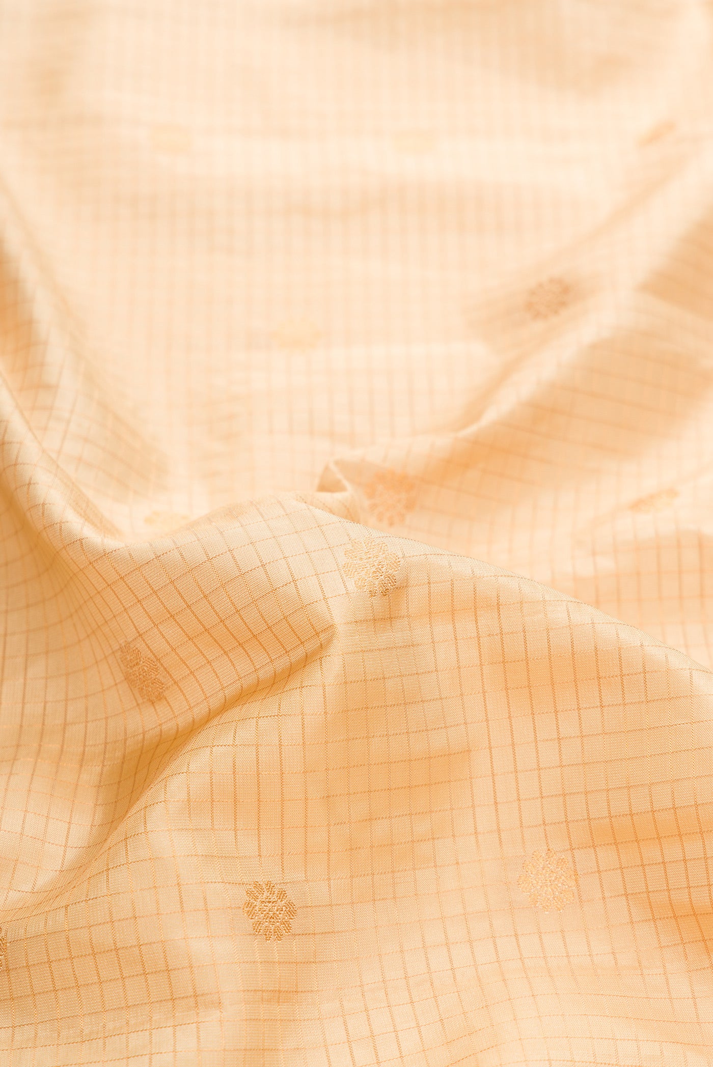 Close up of Sandal Dual Tone Gadwal Silk Saree with Zari Butta on the body and Zari Border.  displaying folds