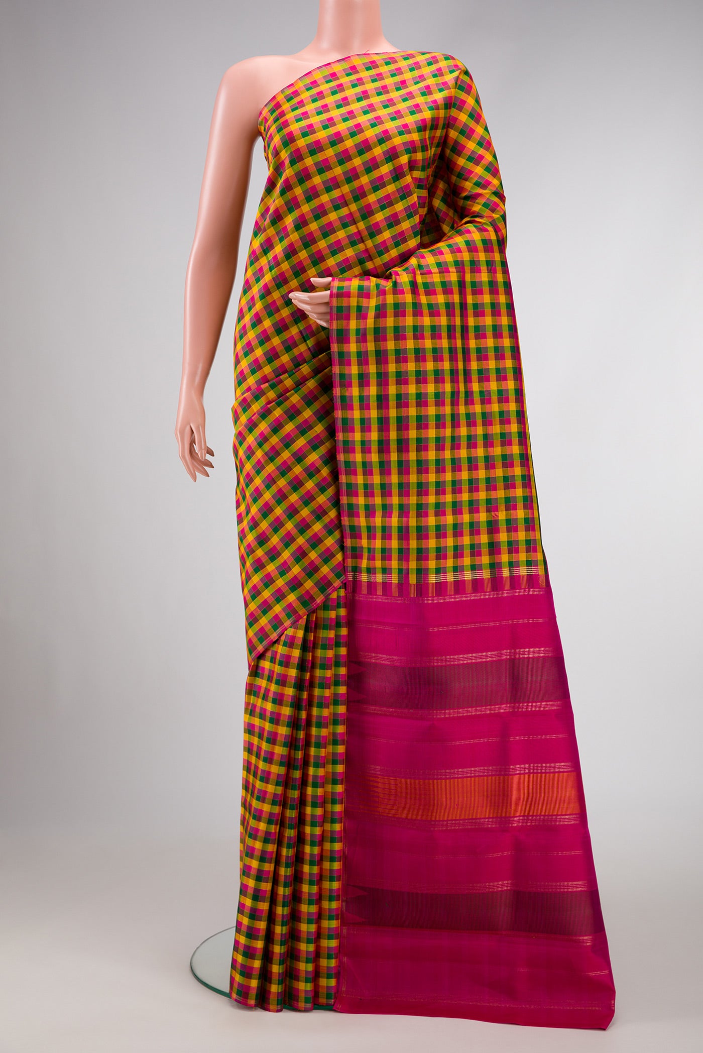 Pure Silk Pure Zari Yellow, Pink and Green Color Kanjivaram Saree with Checked design on the body and Without Border.  displayed on a mannequin