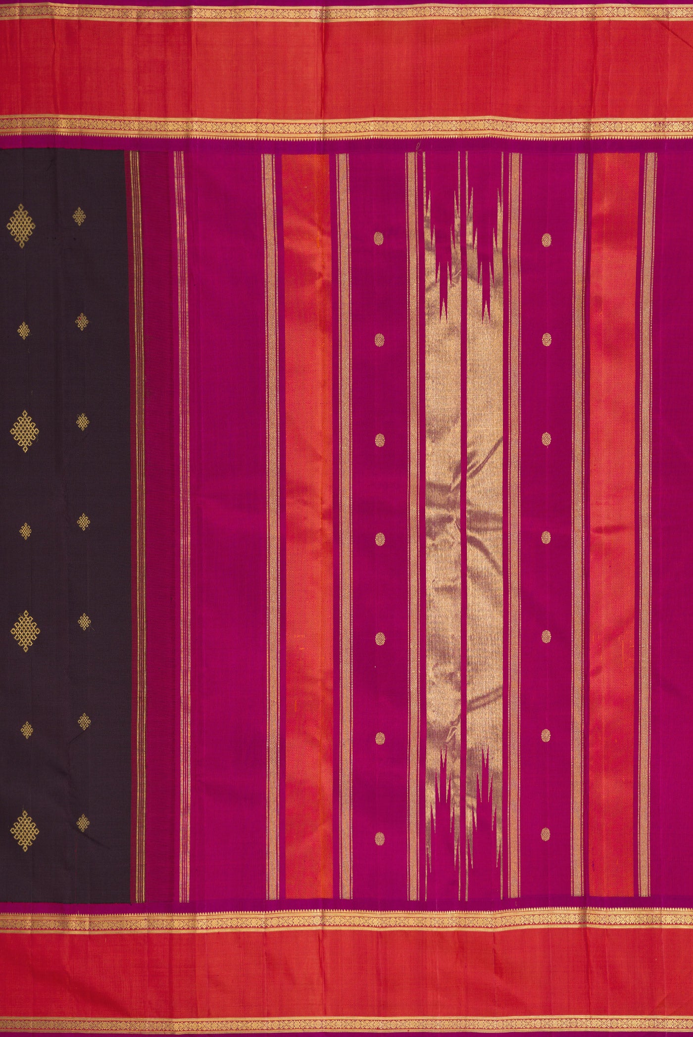 Close up image of the pallu of Pure Silk Pure Zari Coffee Brown Dual Tone Kanjivaram Saree with Zari Butta on the body and Zari Border. 