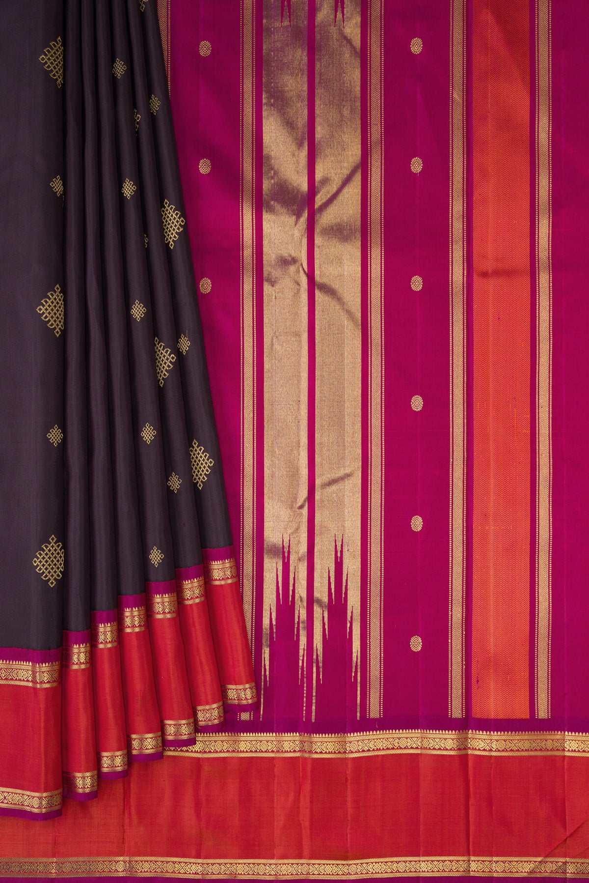 Pleats and pallu of Pure Silk Pure Zari Coffee Brown Dual Tone Kanjivaram Saree with Zari Butta on the body and Zari Border. 