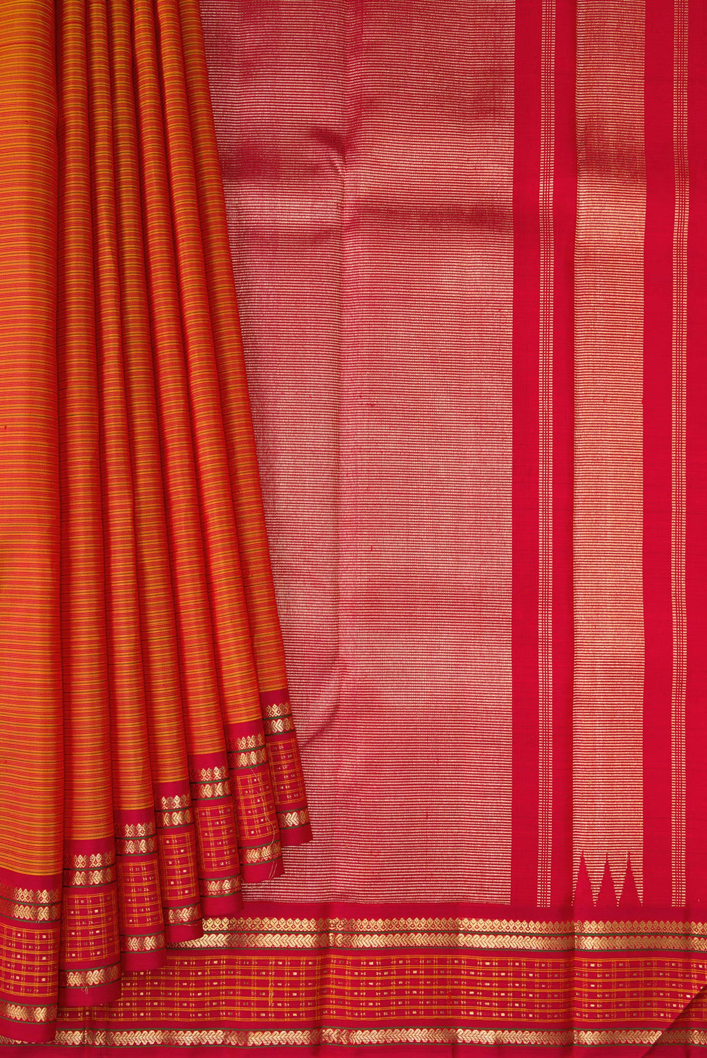 Pleats and pallu of Pure Silk Pure Zari Mustard Kanjivaram Saree with Stripes on the body and Fancy Border. 