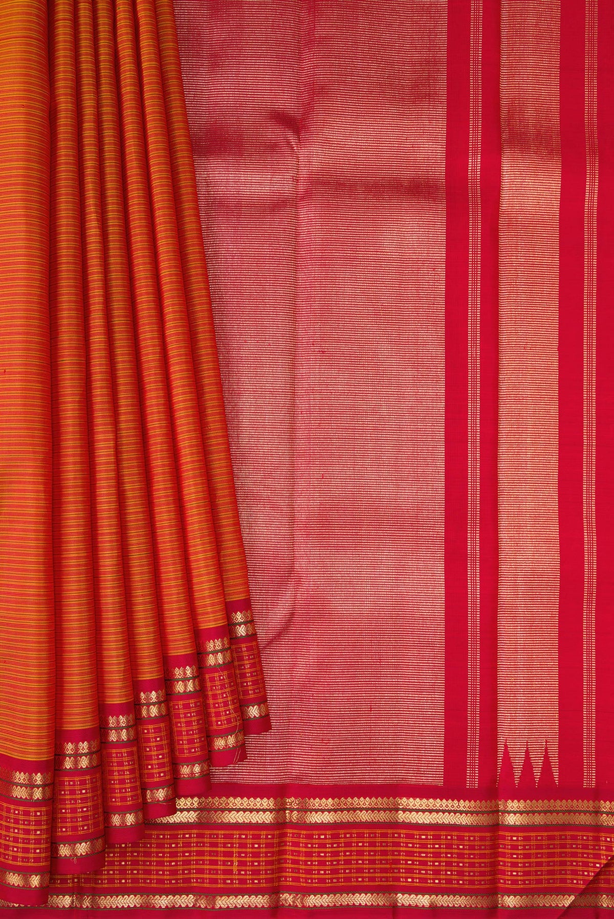 Pleats and pallu of Pure Silk Pure Zari Mustard Kanjivaram Saree with Stripes on the body and Fancy Border. 
