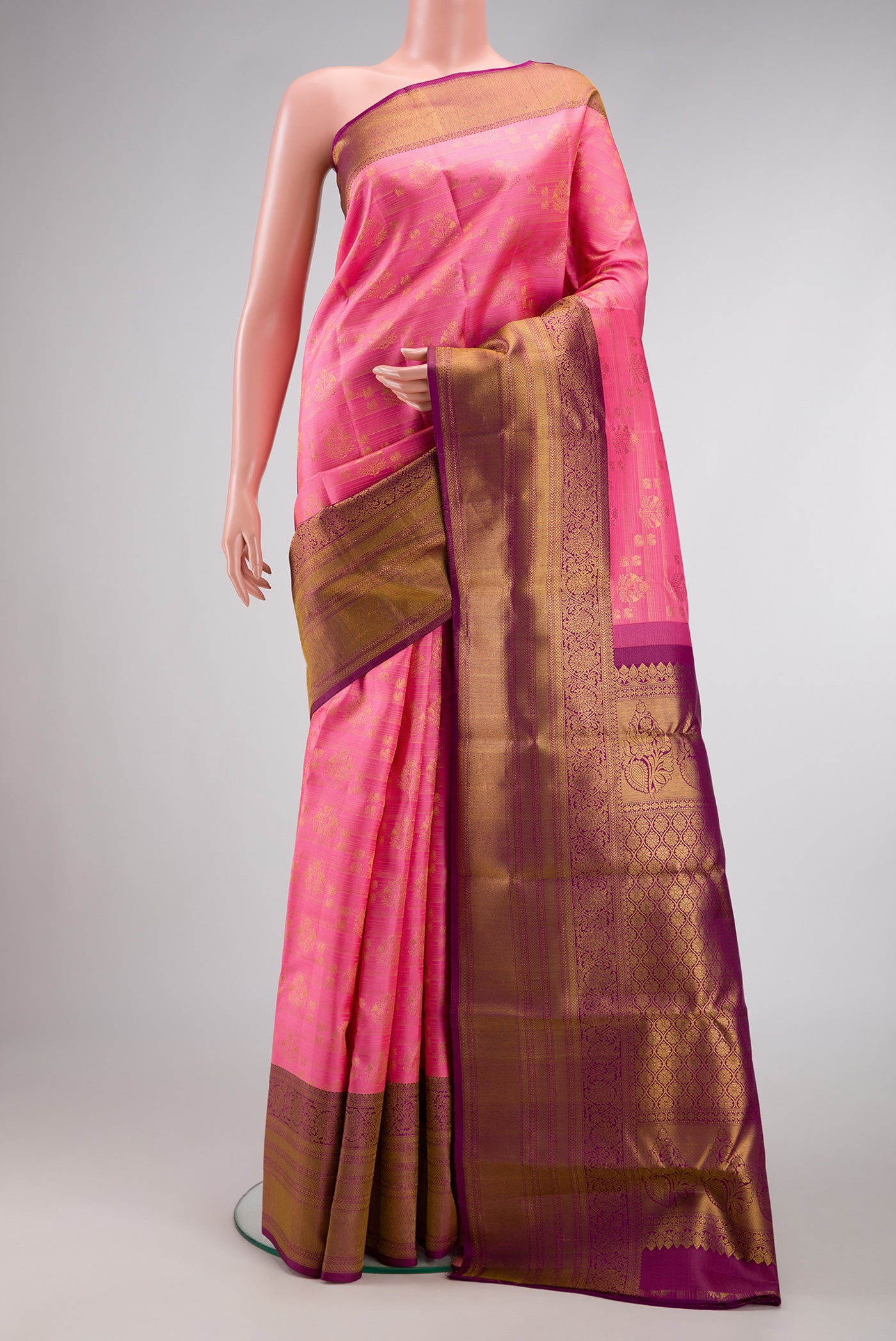 Pink Dual Tone Kanchipuram Silk Saree with Zari Brocade on the body and Zari Border.  displayed on a mannequin