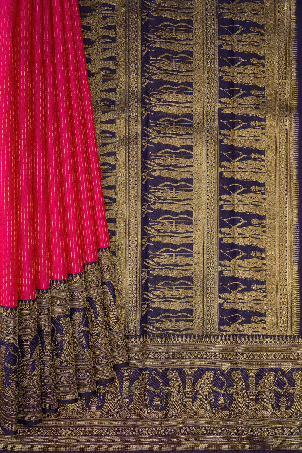 Pleats and pallu of Rani Pink Kanchipuram Silk Saree with Stripes on the body and Fancy Border. 