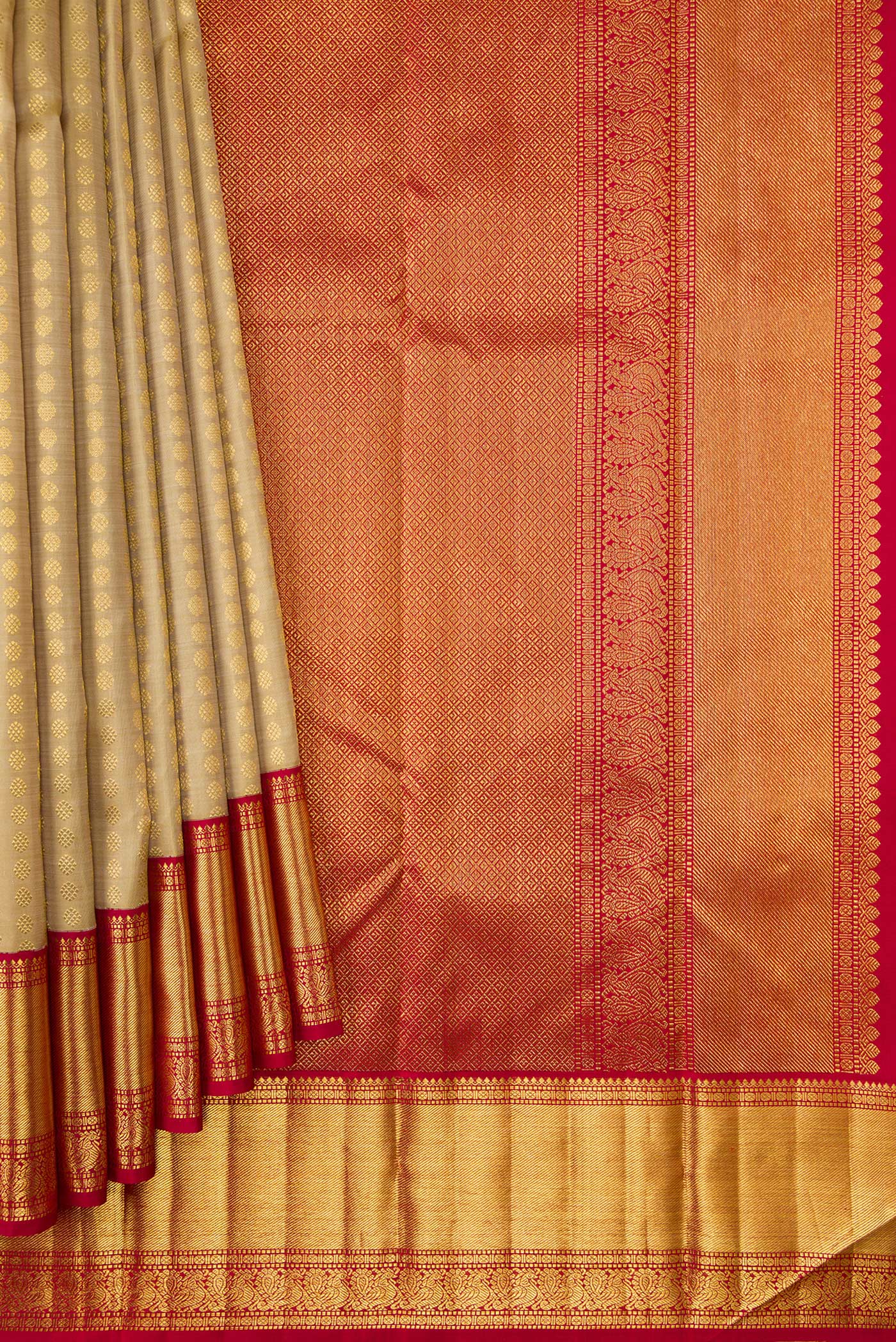 Pleats and pallu of Sandal Dual Tone Kanchipuram Silk Saree with Zari Butta on the body and Zari Border. 