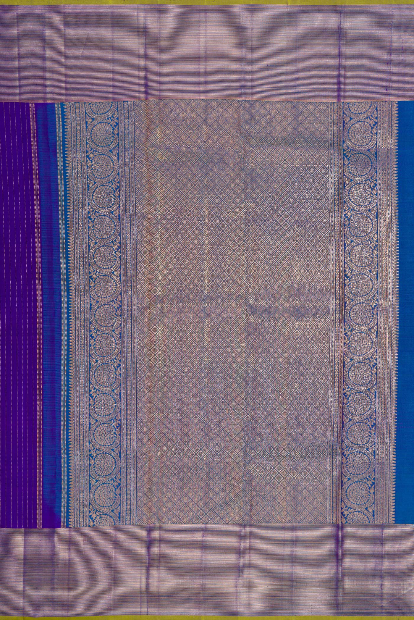 Close up image of the pallu of Royal Blue Dual Tone Kanjivaram Silk Saree with Zari Butta on the body and Zari Border. 