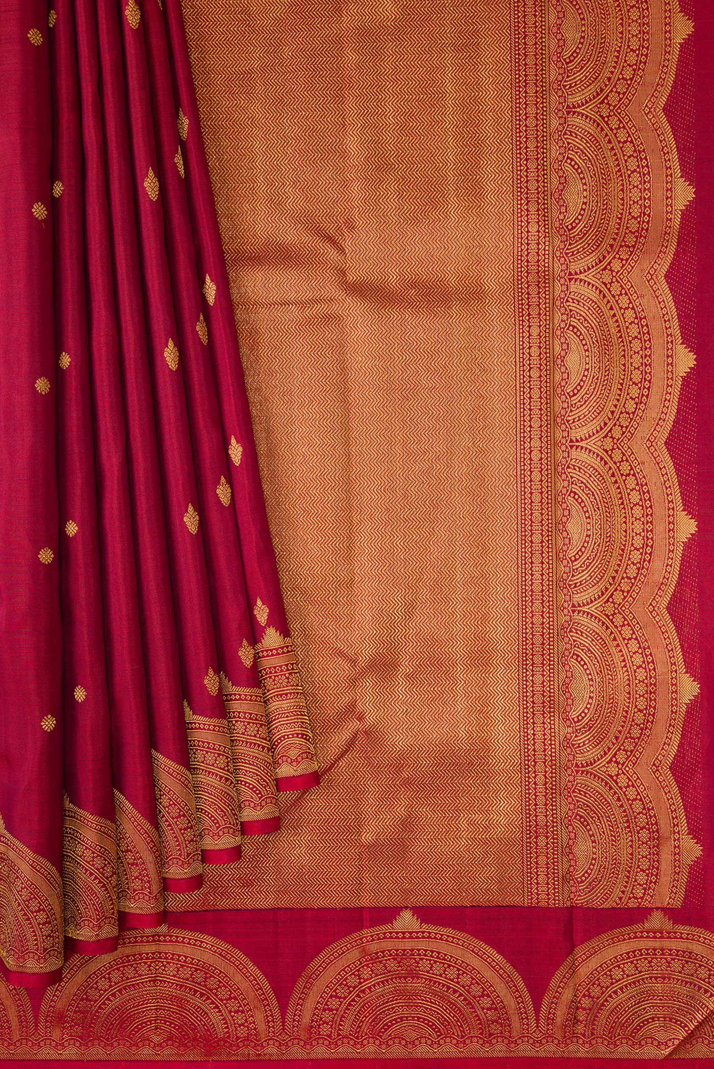 Pleats and pallu of Pure Silk Pure Zari Maroon Dual Tone Kanjivaram Saree with Zari Butta on the body and Fancy Border. 