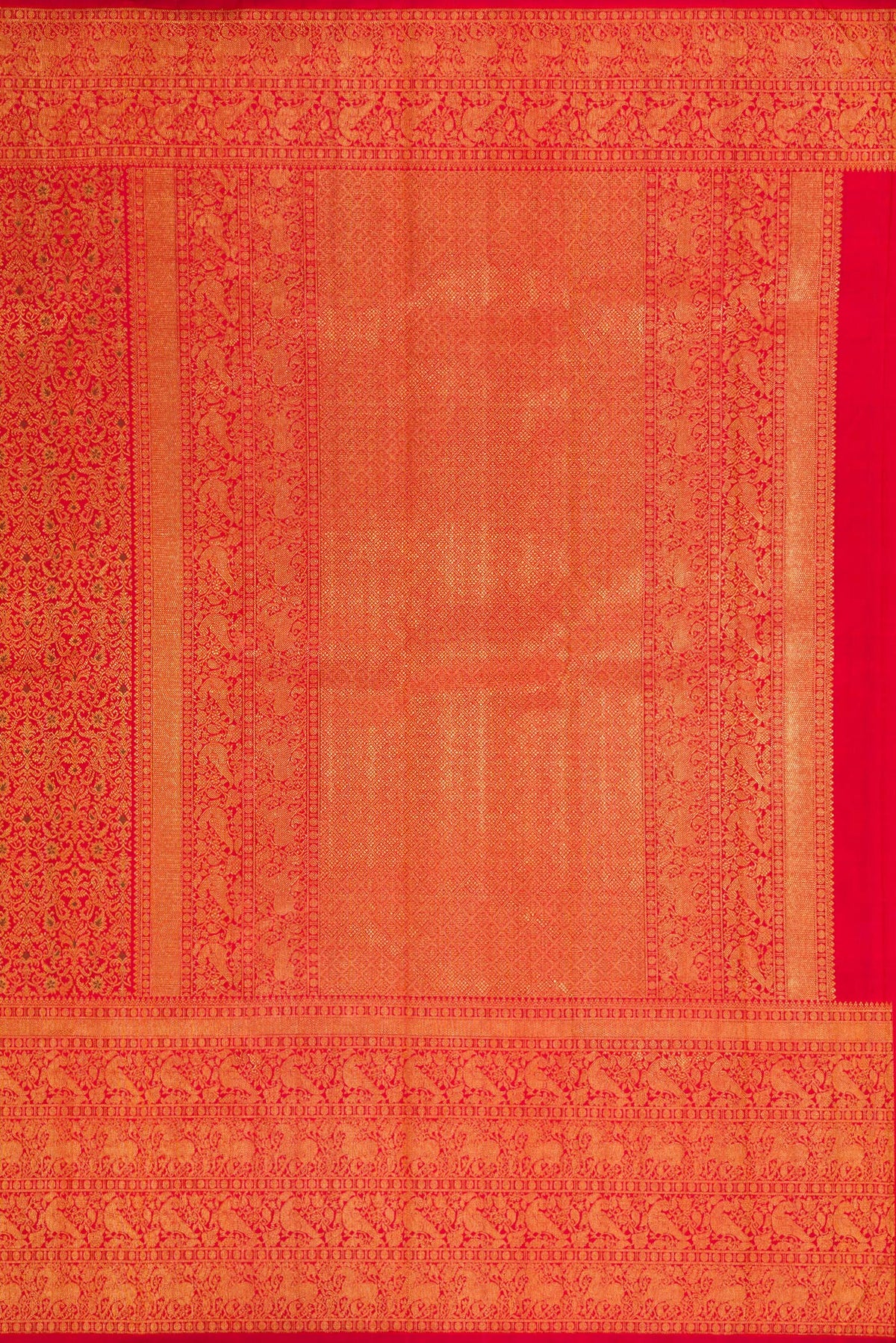 Close up image of the pallu of Red Dual Tone Kanchipuram Silk Saree with Zari Brocade on the body and Zari Border. 