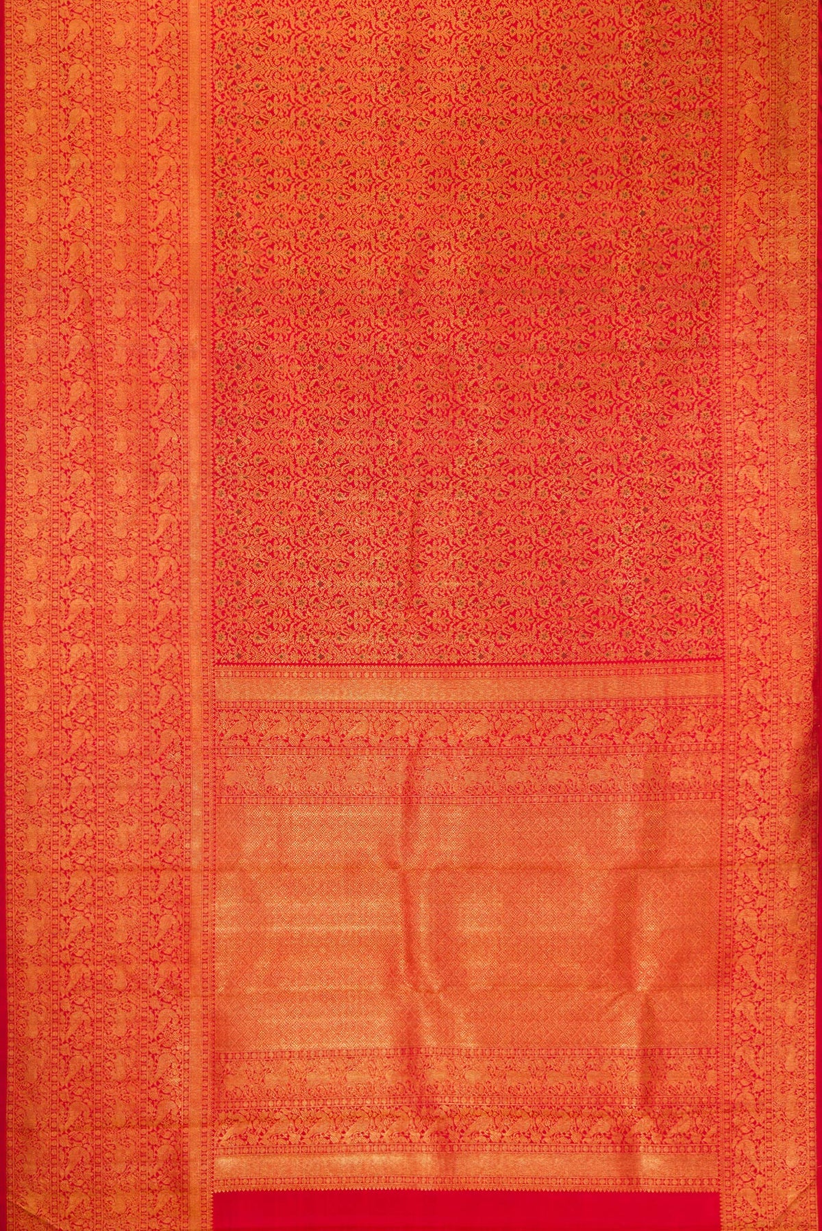 Flat view of Red Dual Tone Kanchipuram Silk Saree with Zari Brocade on the body and Zari Border. 