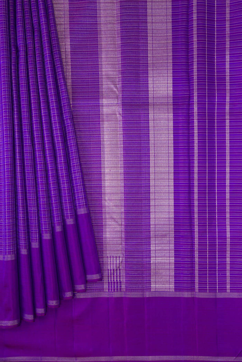 Pleats and pallu of Royal Blue Dual Tone Kanchipuram Silk Saree with Checked design on the body and Zari Border. 