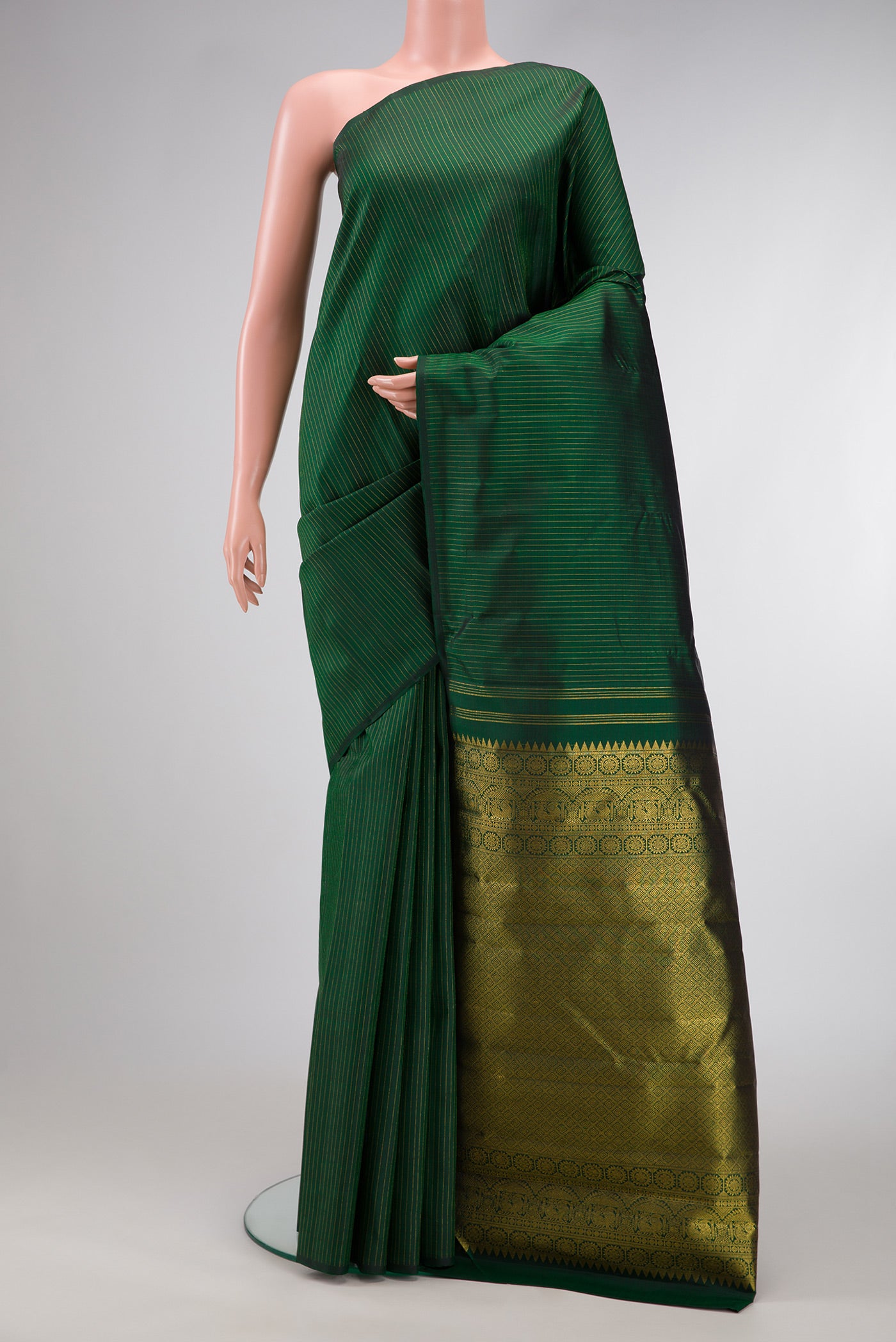 Green Dual Tone Kanjivaram Silk Saree with Stripes on the body and Without Border.  displayed on a mannequin