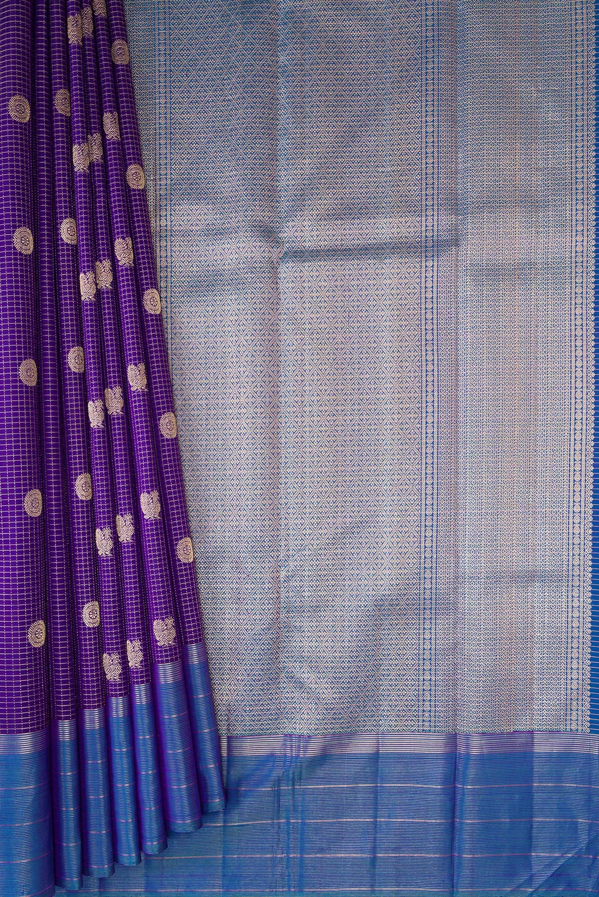 Pleats and pallu of Violet Kanjivaram Silk Saree with Stripes on the body and Zari Border. 