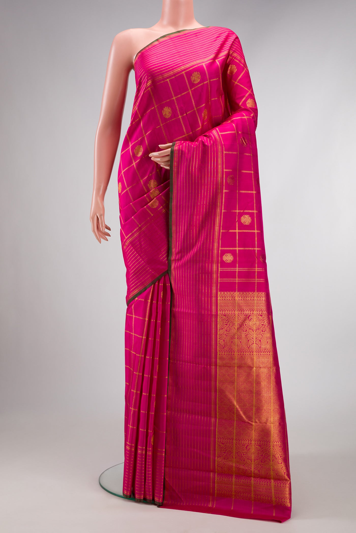 Pure Silk Pure Zari Pink Dual Tone Kanjivaram Saree with Checked design on the body and Zari Border.  displayed on a mannequin