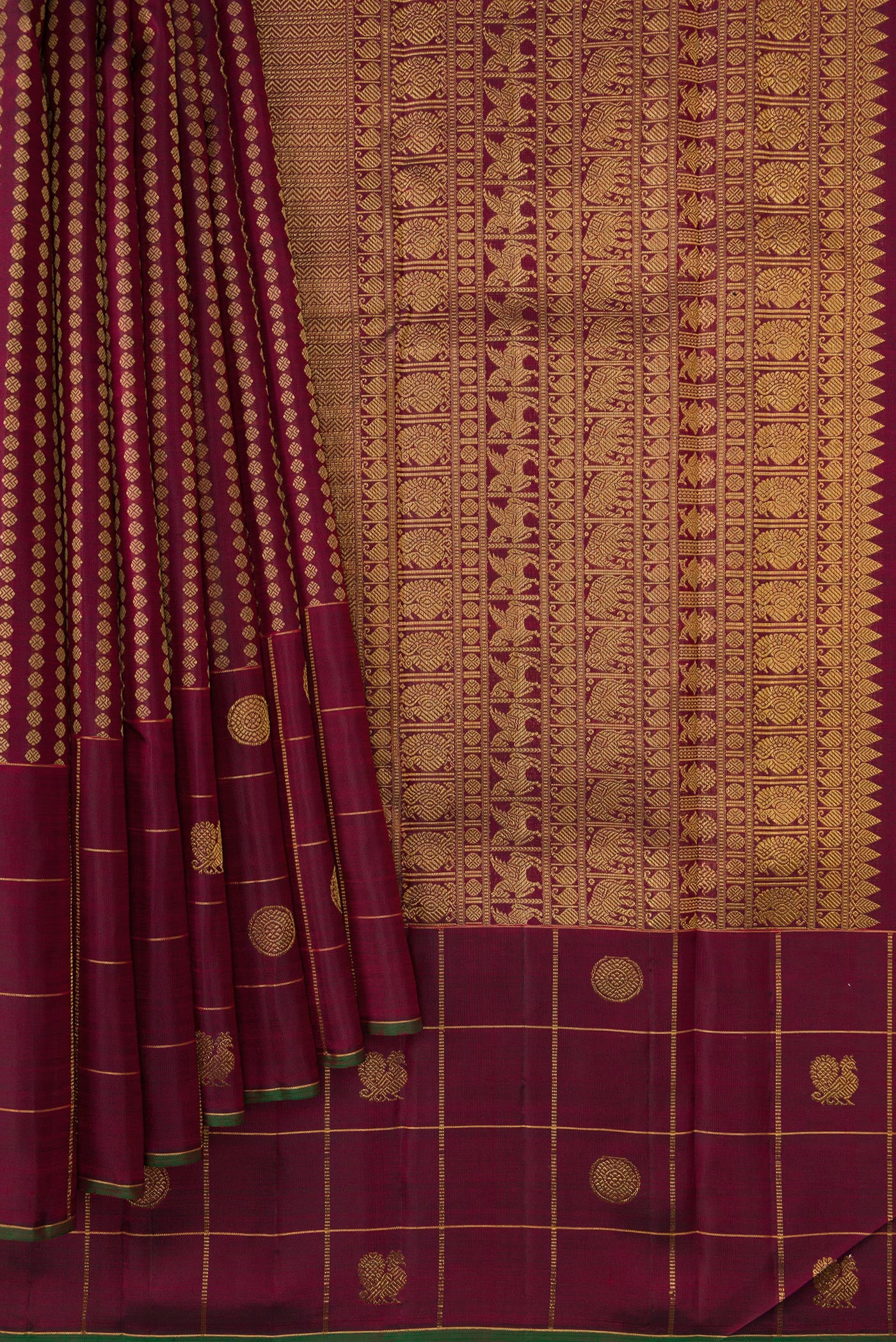 Pleats and pallu of Burgundy Dual Tone Kanjivaram Silk Saree with Zari Butta on the body and Fancy Border. 