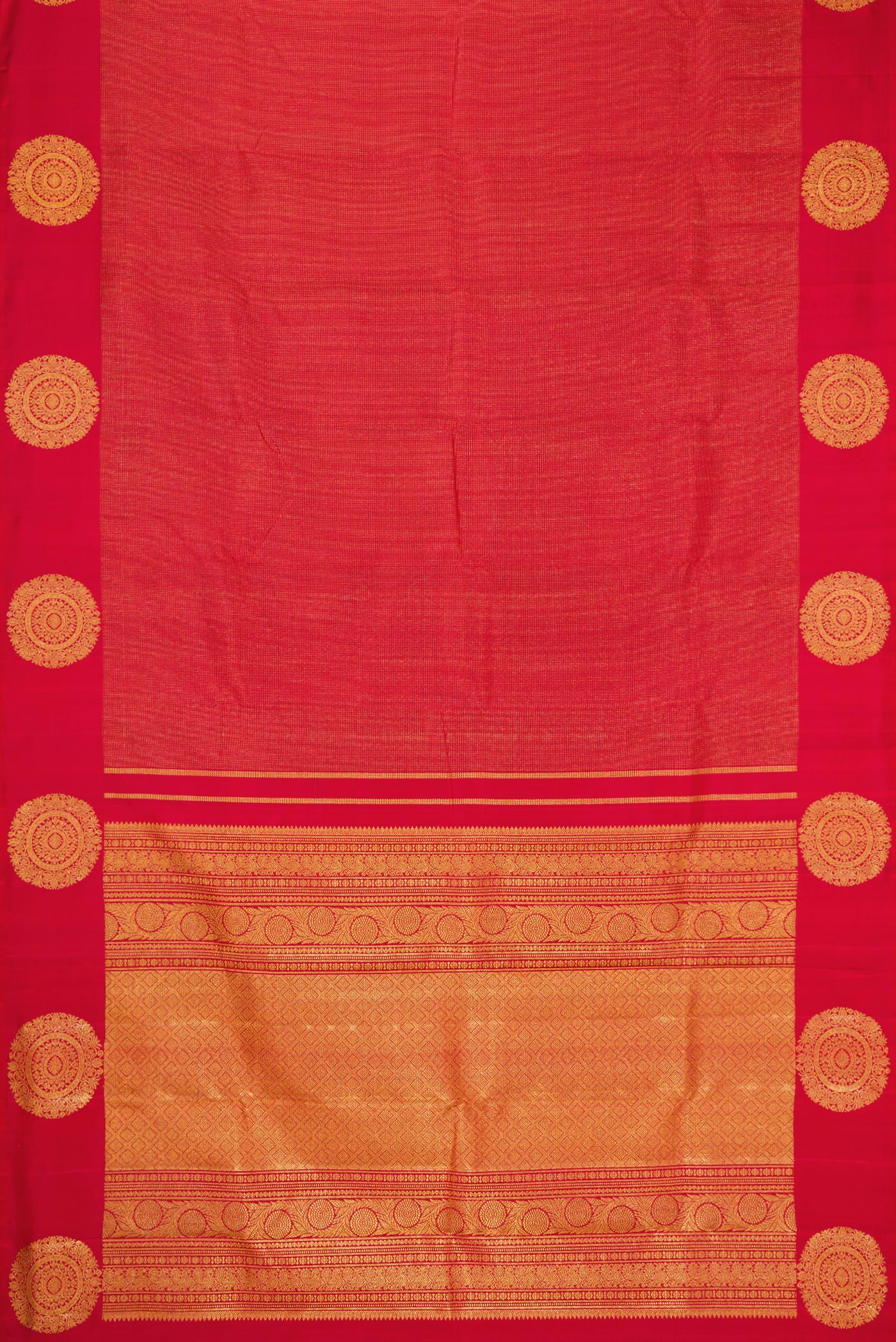 Flat view of Red Kanjivaram Silk Saree with Zari Brocade on the body and Fancy Border. 